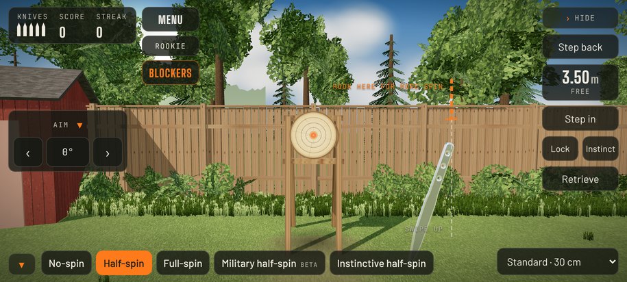 Backyard range: a wooden target in a fenced garden